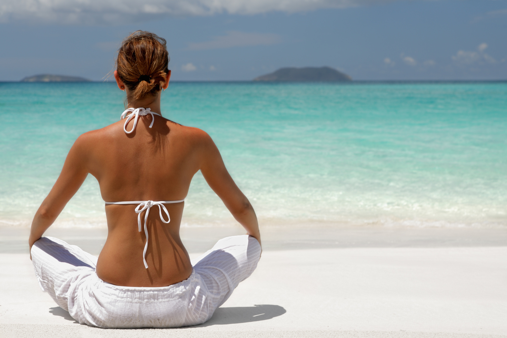 Mal di schiena da spiaggia, come prevenirlo?